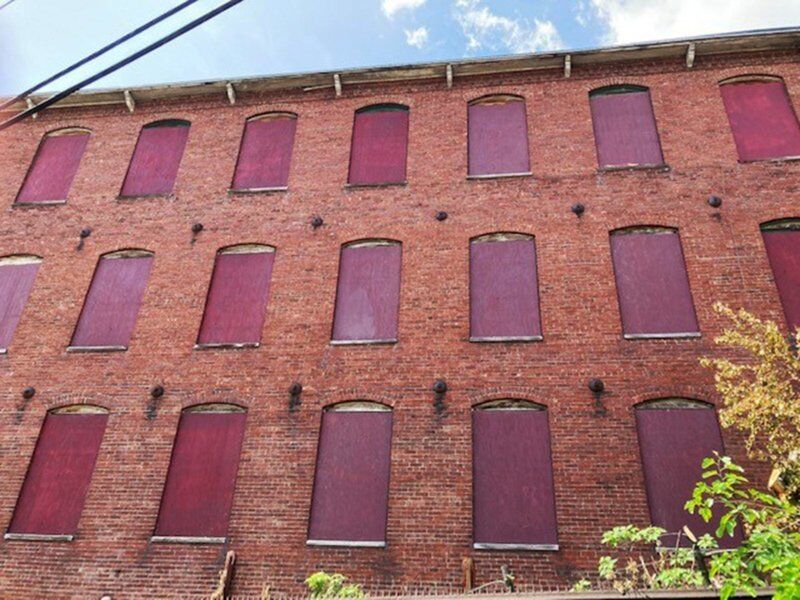 City boards up vacant Stevens Mill buildings to stop intruders